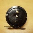 ROUSEK  černě lakovaný   pr. 62 mm, s řehtačkou, vyvážená klička ,signovaný ROUSEK Č.S.R