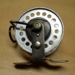 ROUSEK hliník ,pr.60 mm,s řehtačkou, vodící očko kruhové ,signovaný Rousek