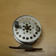 ROUSEK hliník ,pr.60 mm,s řehtačkou,bez vodícího očka ,signovaný Rousek