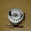 ROUSEK hliník ,pr.60 mm,s vypínací  řehtačkou, vodící očko kruhové ,signovaný Rousek