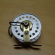 ROUSEK hliník ,pr. 75 mm,s řehtačkou, vodící očko kruhové ,signovaný Rousek